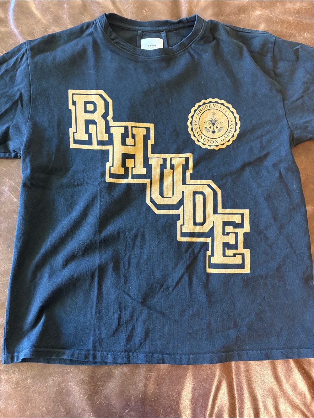 Rhude Men’s Navy Blue Tee with Gold Graphic Logo